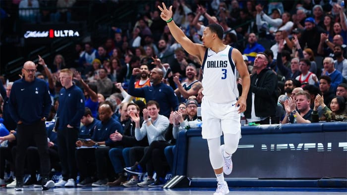 Dallas Mavericks forward Grant Williams reacts after scoring